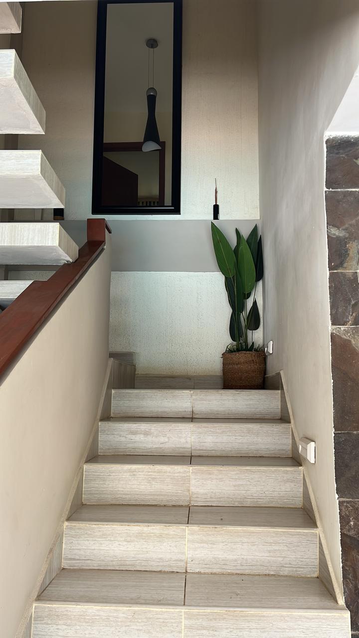 Stairs to Bedroom at House of Grace beachfront property